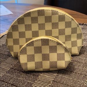 White and gray checkered cosmetic bags. Brand new!